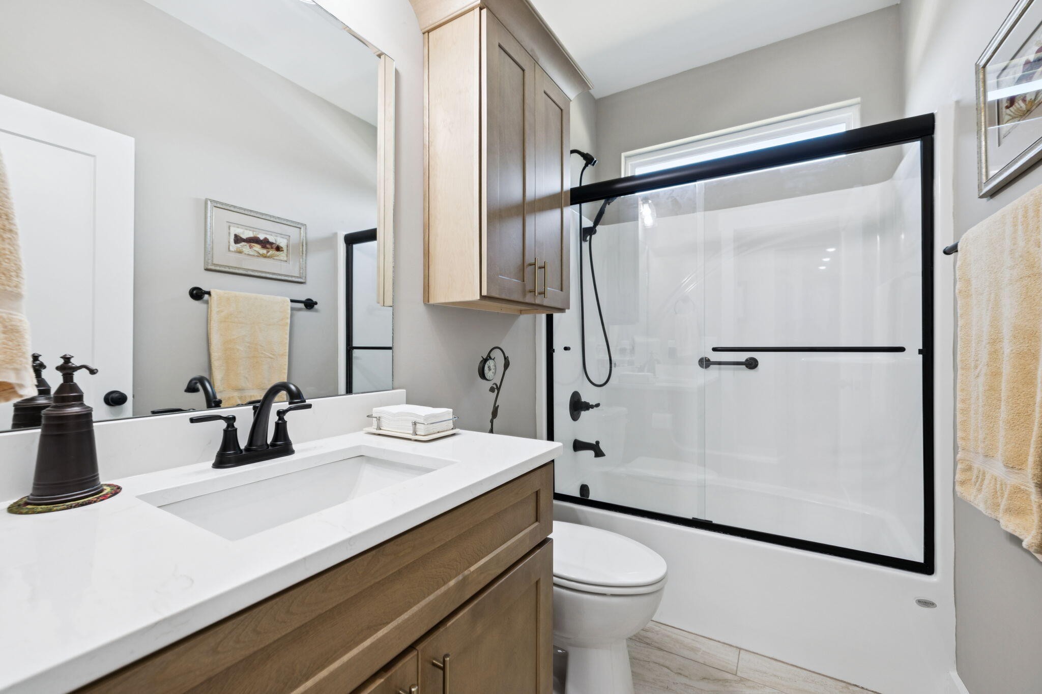 75 Battleview Drive Ringgold, GA 30736 - Photo 30 of 58 a bathroom with a double vanity sink toilet mirror and shower