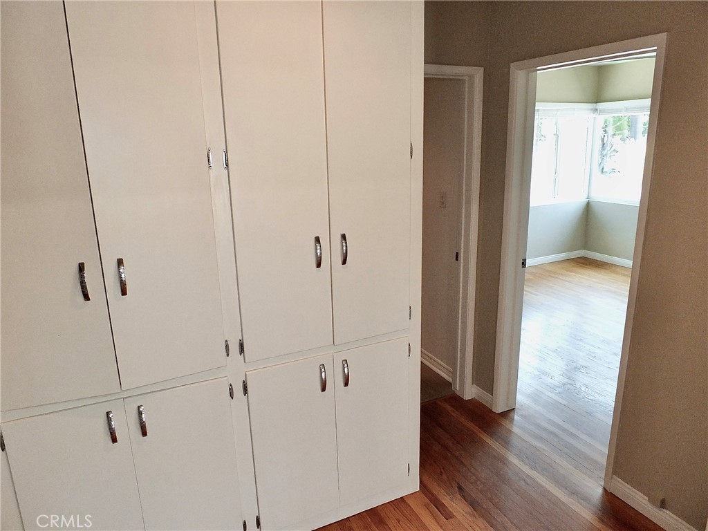 1808 East Appleton Street, Unit 7 Long Beach, CA 90802 - Photo 20 of 44 a view of a hallway with wooden floor