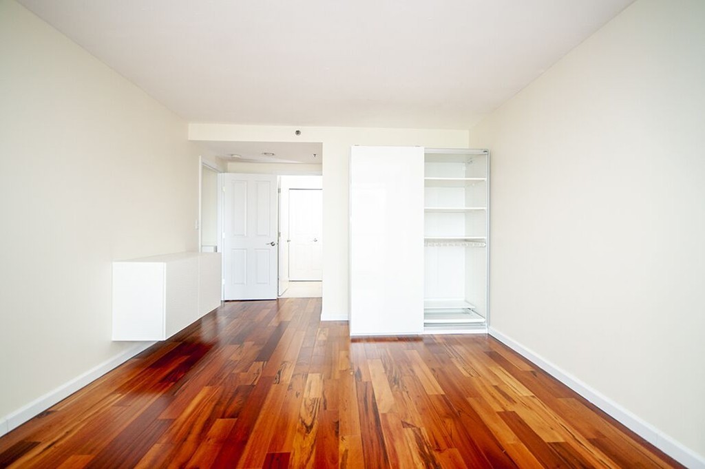 10 Museum Way, Unit 1521 Cambridge, MA 02141 - Photo 10 of 21 a view of a room with wooden floor