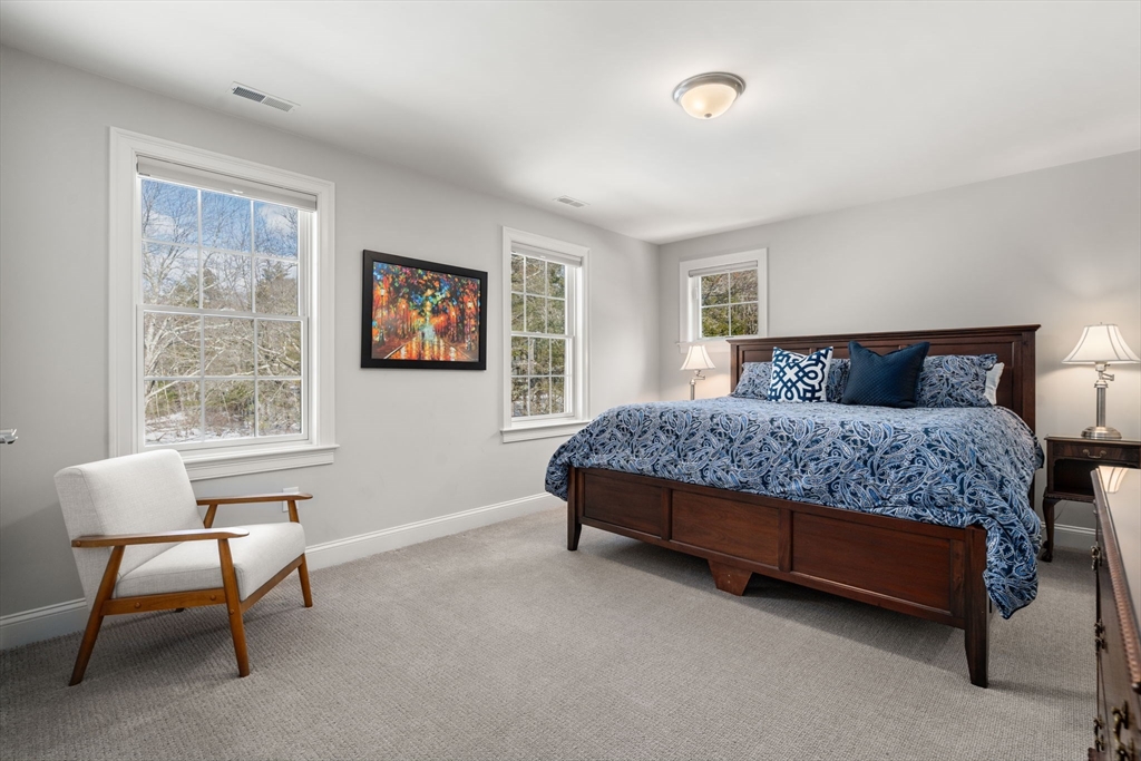 72 Moore Road Wayland, MA 01778 - Photo 18 of 23 a bedroom with a bed chair and window