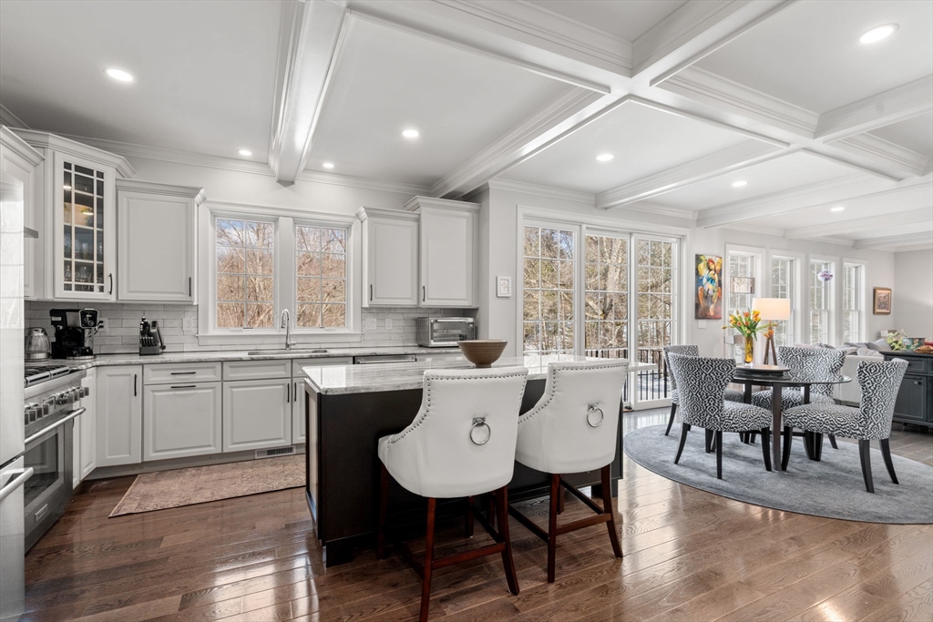 72 Moore Road Wayland, MA 01778 - Photo 6 of 23 a large kitchen with a table and chairs