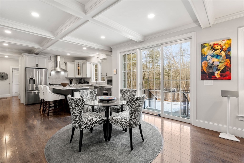 72 Moore Road Wayland, MA 01778 - Photo 10 of 23 a dining room with furniture and wooden floor
