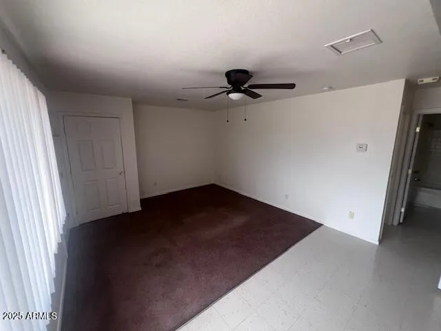 a view of workspace with furniture and window