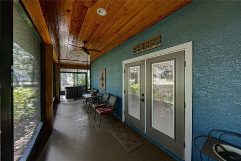 a view of a lake with a yard