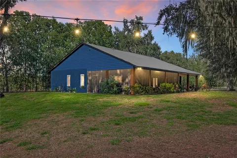 a view of a backyard with green space