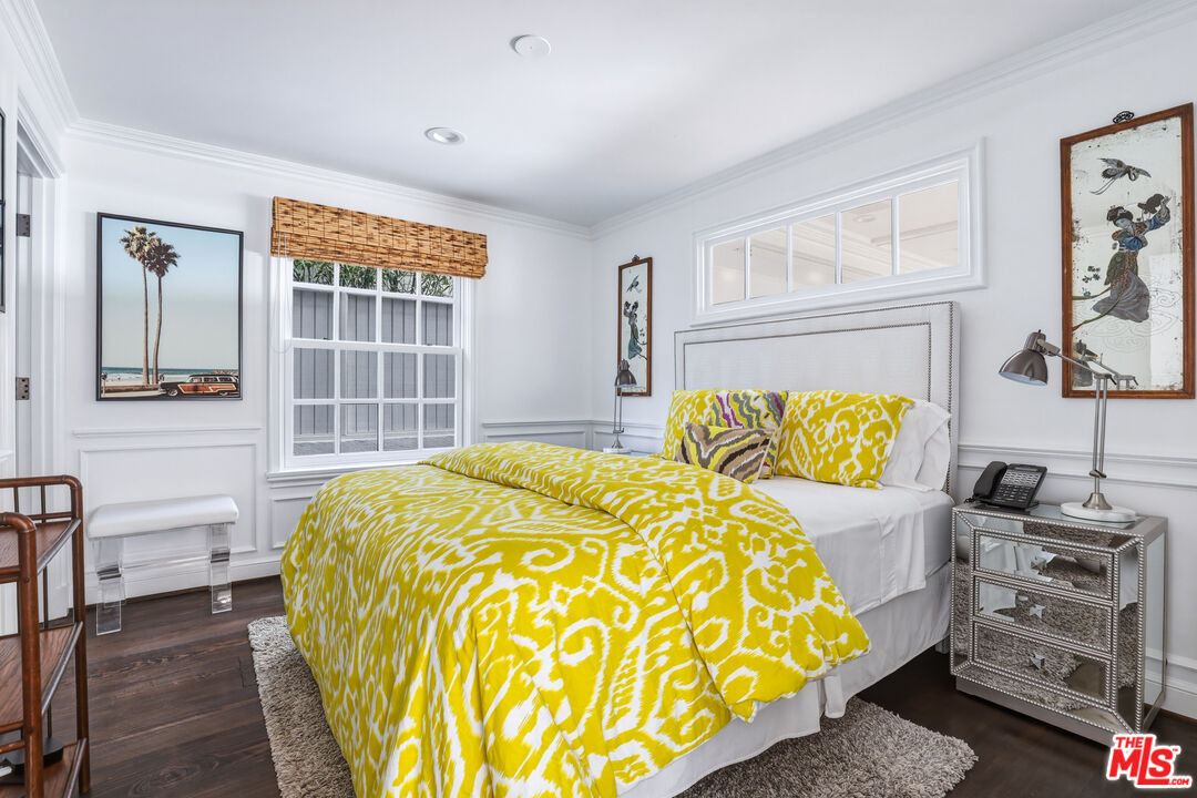 30810 Broad Beach Road Malibu, CA 90265 - Photo 45 of 55 a bed sitting in a bedroom next to a window