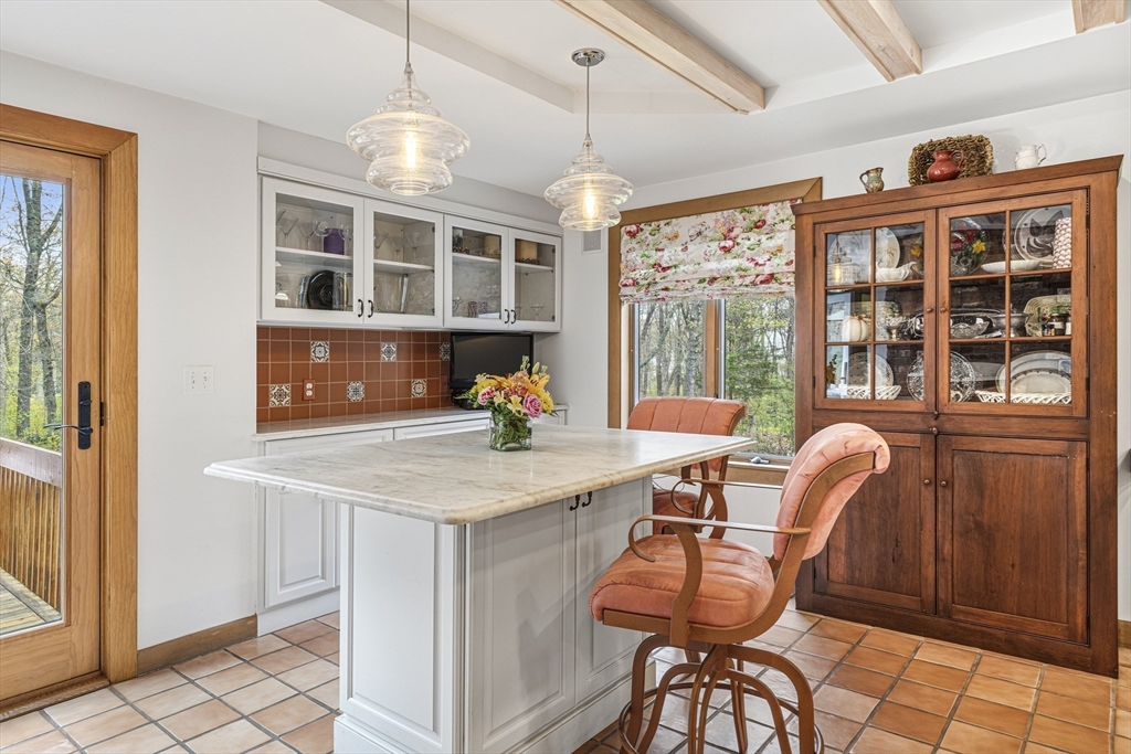 94 Howland Road Westport, MA 02790 - Photo 17 of 33 a dining room with furniture and window