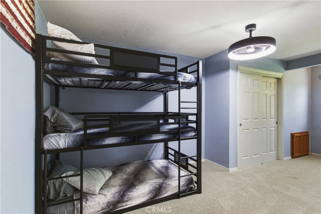 3856 North Gardner Avenue Merced, CA 95340 - Photo 36 of 59 a view of a room with racks on the wall