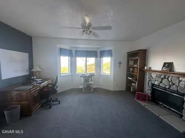 a room with furniture and window