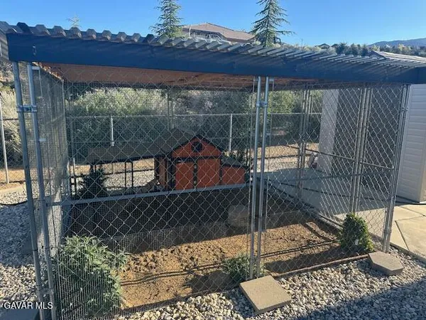 a view of a balcony with a potted plant