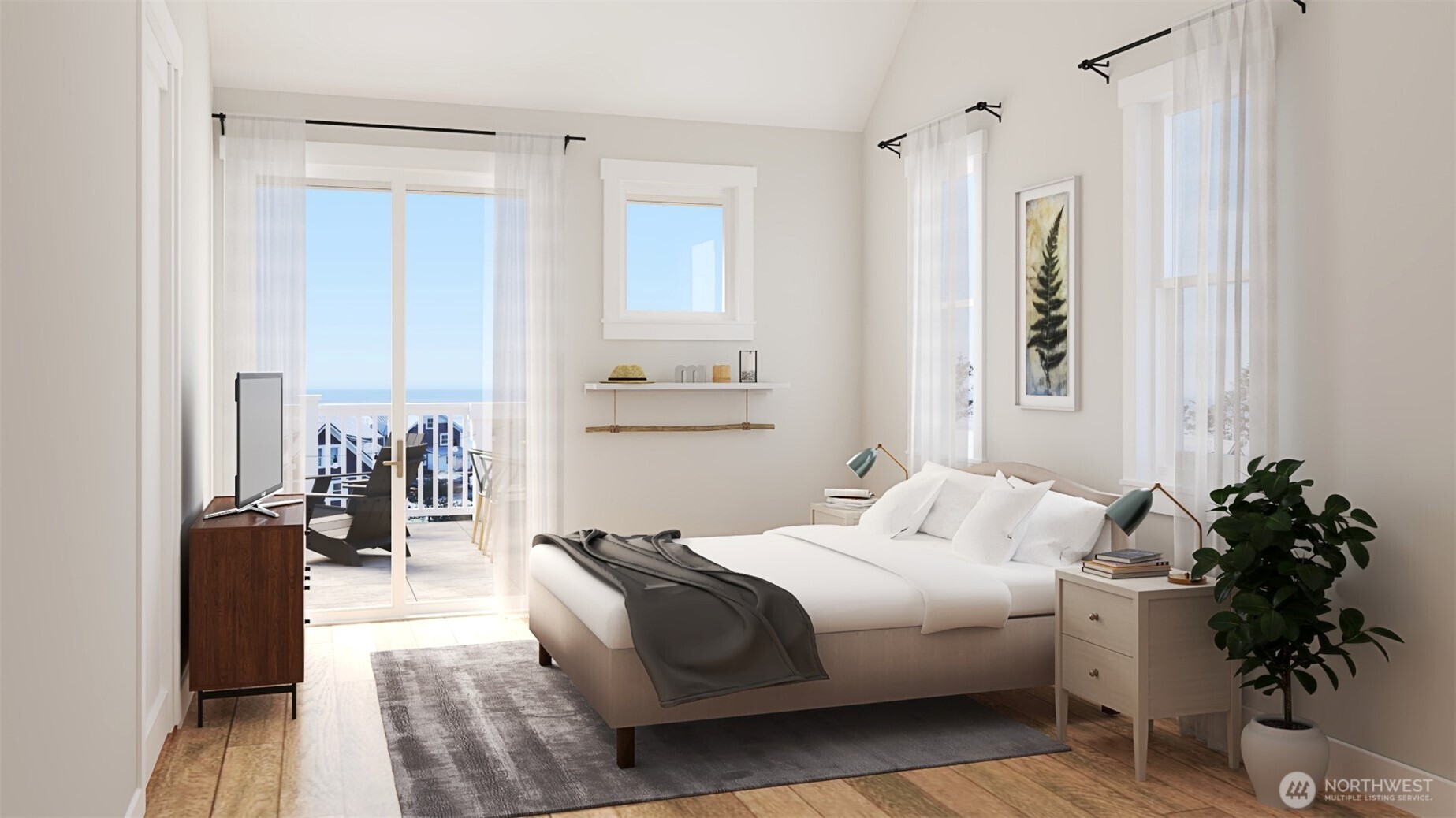 216 Front Street Pacific Beach, WA 98571 - Photo 12 of 24 a bedroom with a large bed and a potted plant