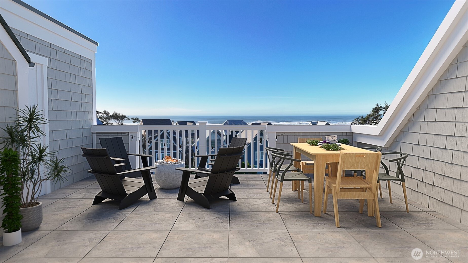 216 Front Street Pacific Beach, WA 98571 - Photo 6 of 24 a view of a terrace with chairs and a potted plant