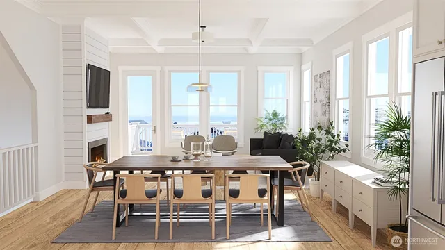 a view of a dining room with furniture and window