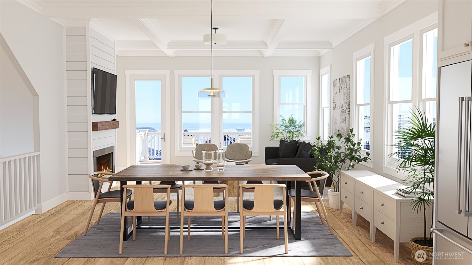 216 Front Street Pacific Beach, WA 98571 - Photo 10 of 24 a view of a dining room with furniture window and wooden floor