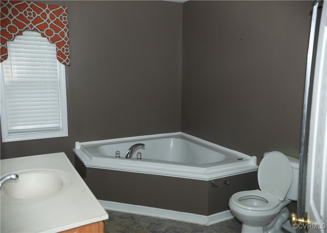 5401 Warwick Road Richmond, VA 23224 - Photo 8 of 10 Full bath with a bath and vanity and shower