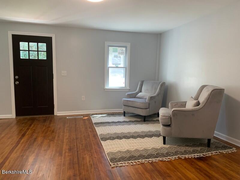 2312 State Road Richmond, MA 01254 - Photo 11 of 37 a living room with furniture and a window