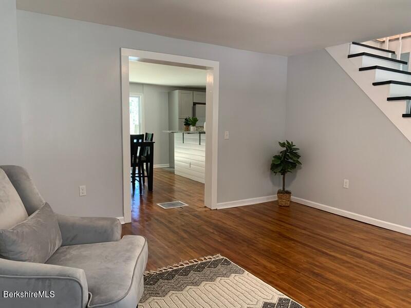 2312 State Road Richmond, MA 01254 - Photo 14 of 37 a living room with furniture and a potted plant