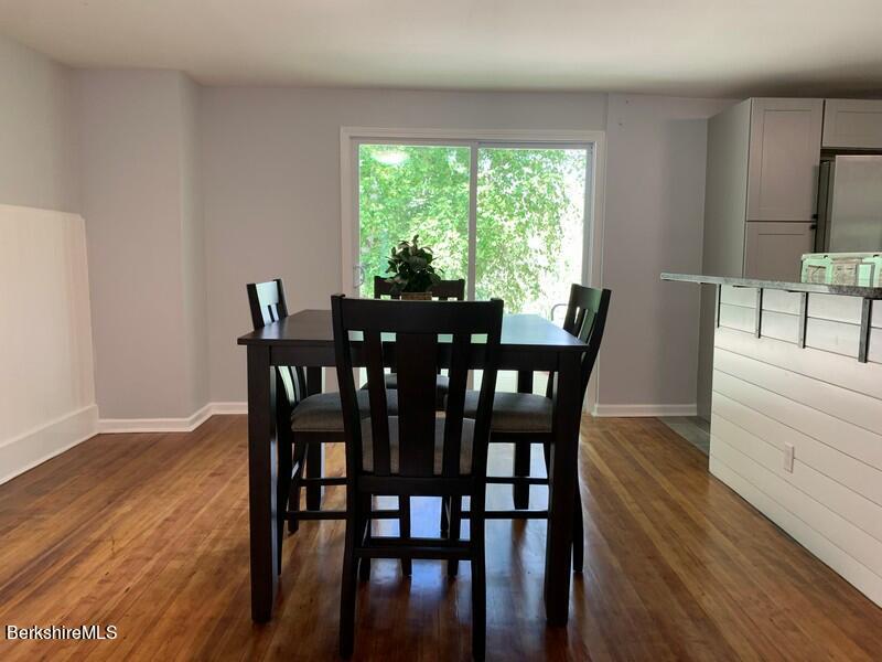 2312 State Road Richmond, MA 01254 - Photo 15 of 37 a view of a dining room with furniture window and wooden floor