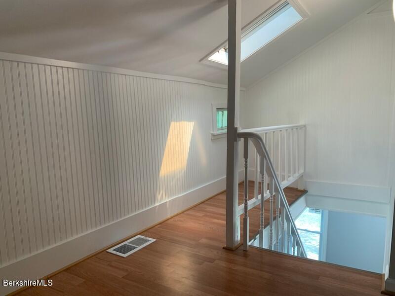 2312 State Road Richmond, MA 01254 - Photo 23 of 37 a view of an entryway with wooden floor