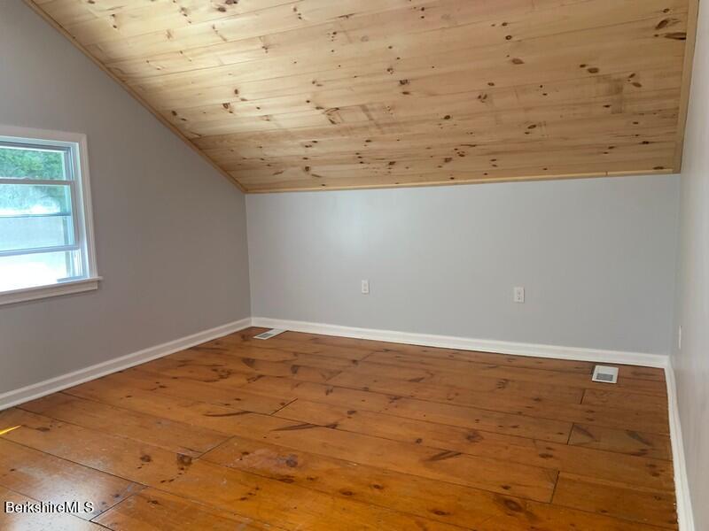 2312 State Road Richmond, MA 01254 - Photo 32 of 37 a view of wooden floor and cabinet in an empty room