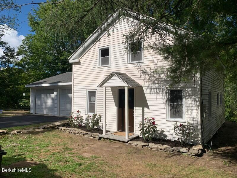 2312 State Road Richmond, MA 01254 - Photo 4 of 37 a view of a house with a yard and large tree