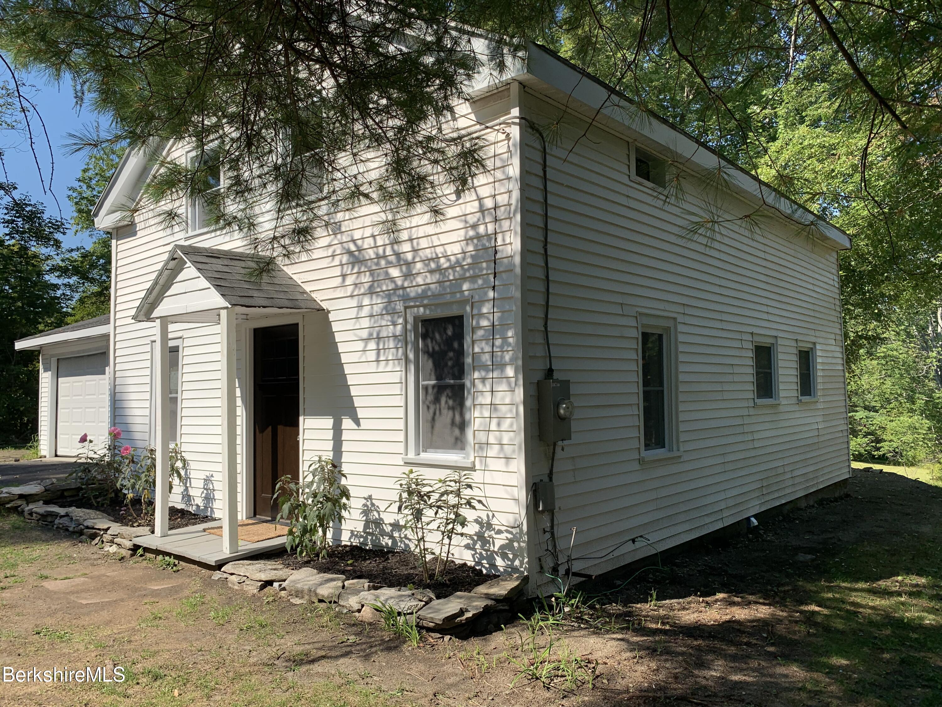 2312 State Road Richmond, MA 01254 - Photo 5 of 37 a view of a house with a yard