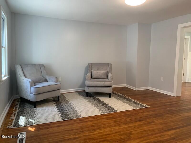 2312 State Road Richmond, MA 01254 - Photo 9 of 37 a living room with furniture and a wooden floor