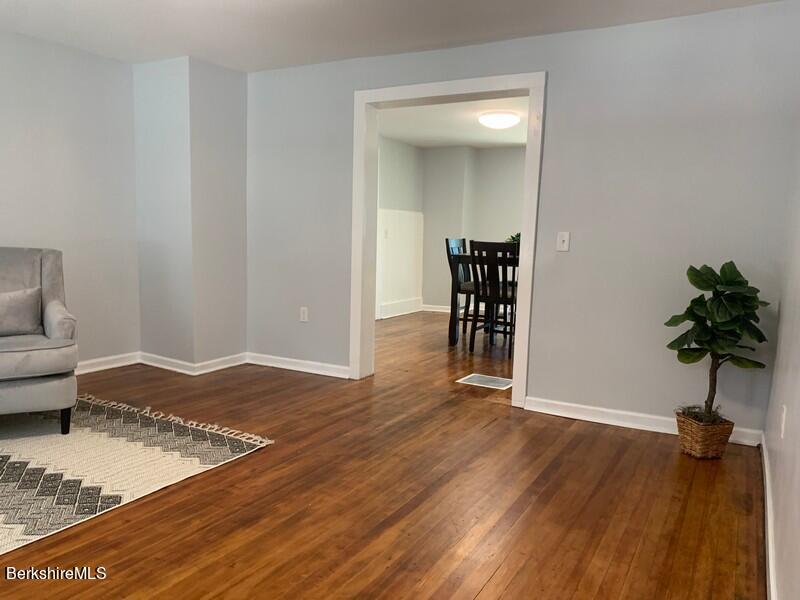 2312 State Road Richmond, MA 01254 - Photo 10 of 37 a view of a livingroom with furniture and a potted plant