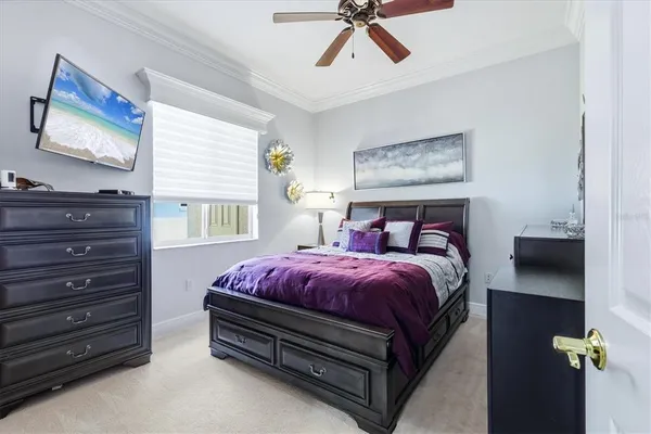 a bed room with a bed and a painting