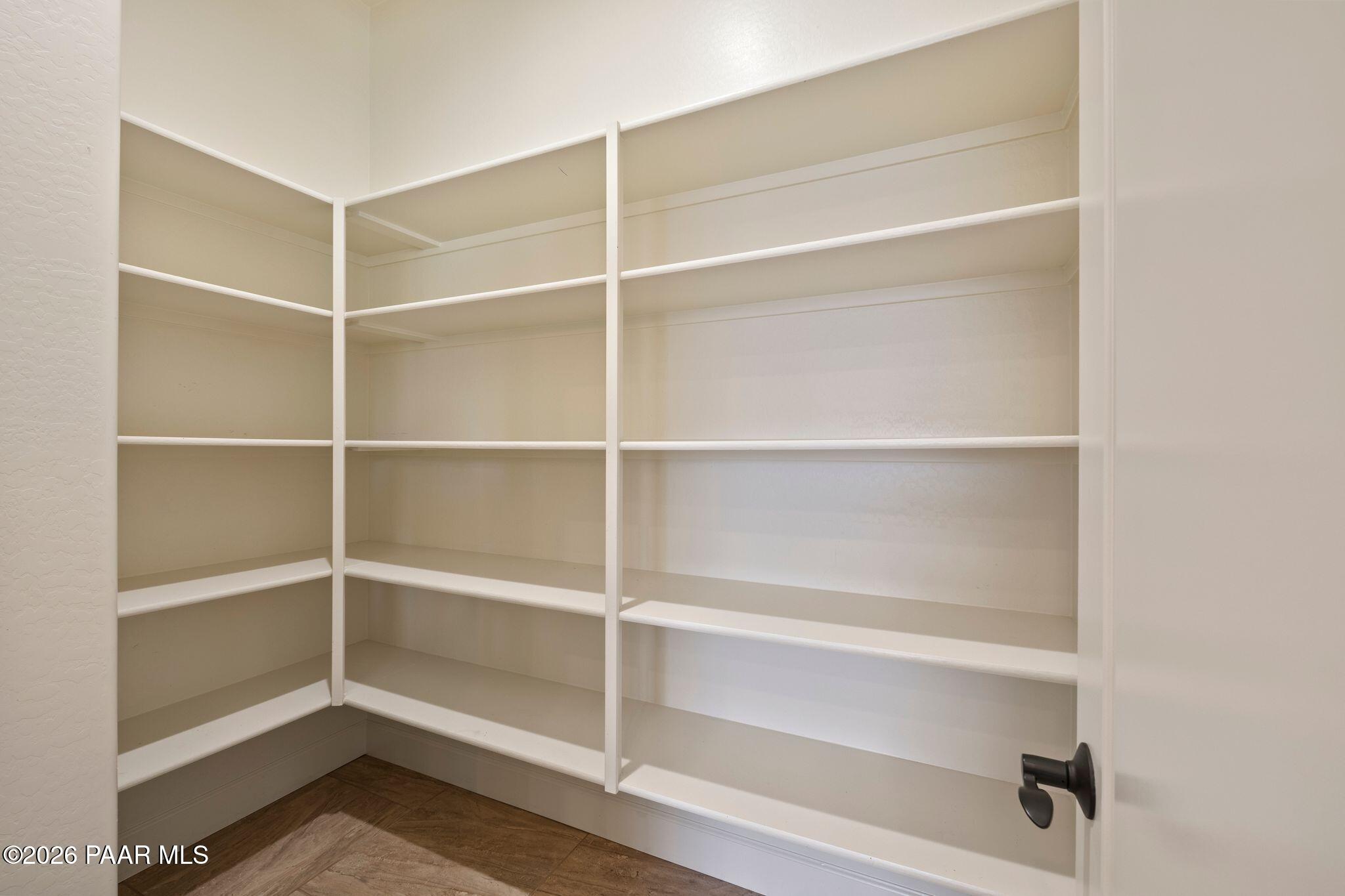 4850 West Three Forks Road Prescott, AZ 86305 - Photo 18 of 69 a view of walk in closet with empty racks