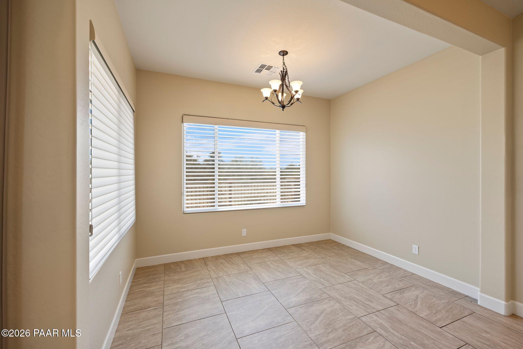 4850 West Three Forks Road Prescott, AZ 86305 - Photo 19 of 69 a view of an empty room with a window