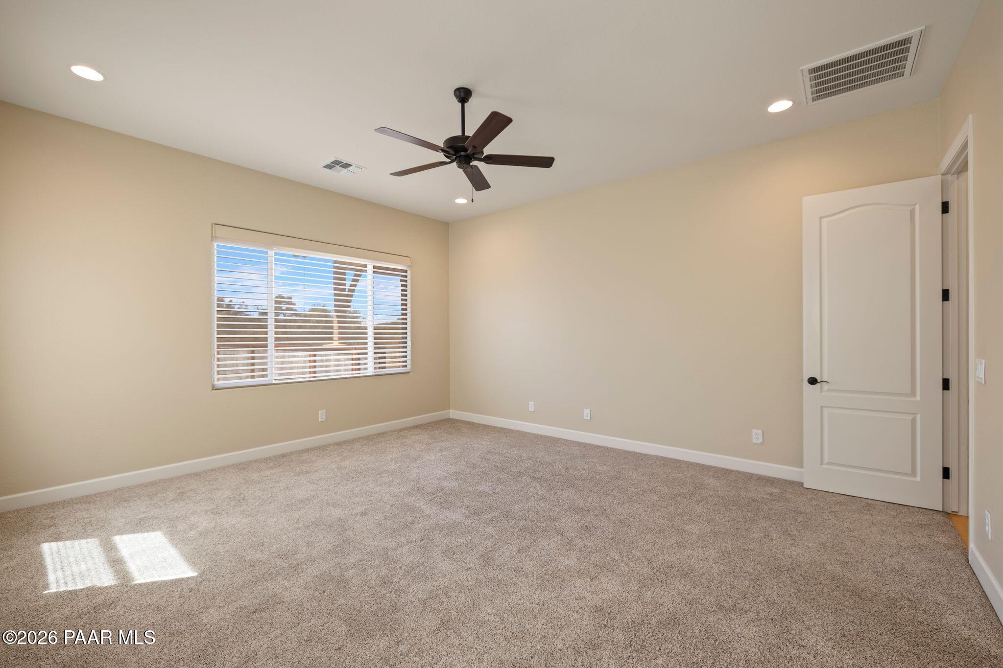 4850 West Three Forks Road Prescott, AZ 86305 - Photo 23 of 69 a view of an empty room with a window