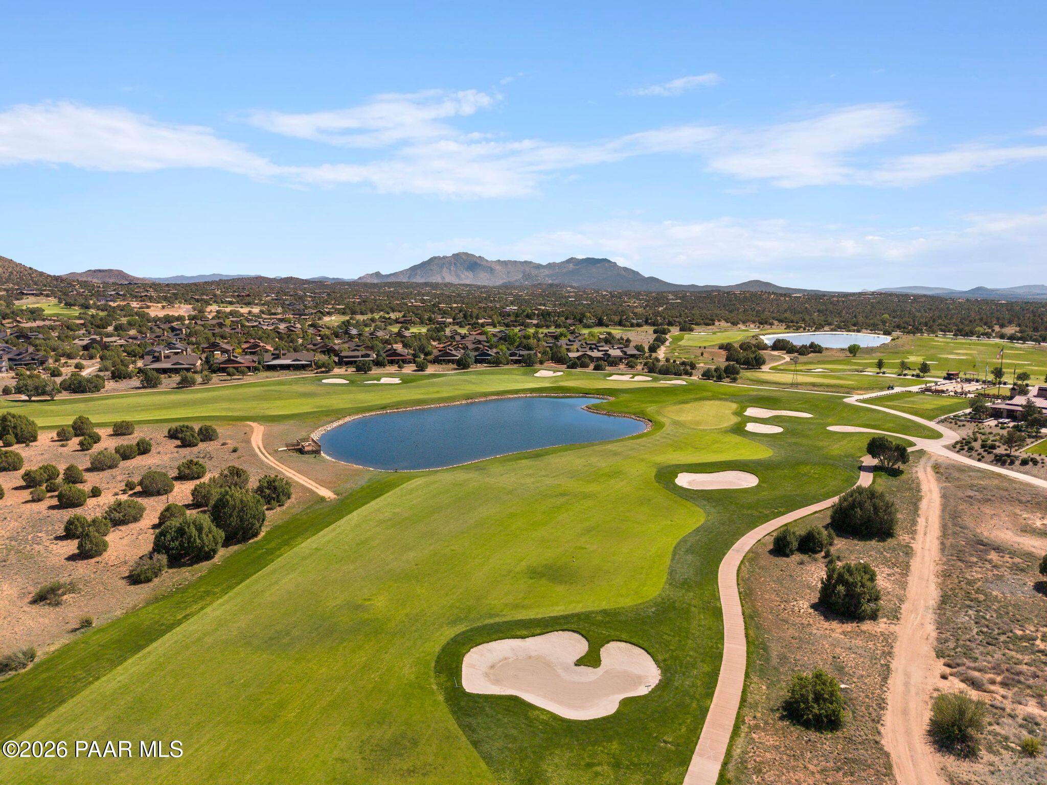 4850 West Three Forks Road Prescott, AZ 86305 - Photo 61 of 69 a view of a swimming pool with a lake view
