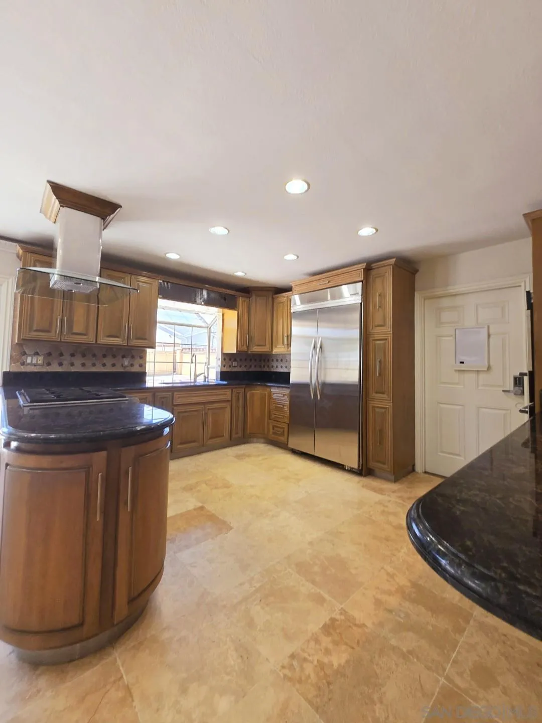 68 Bonita Road Chula Vista, CA 91910 - Photo 34 of 57 a view of kitchen and hall with wooden floor