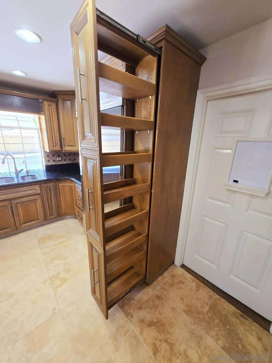 68 Bonita Road Chula Vista, CA 91910 - Photo 35 of 57 a view of walk in closet with empty racks