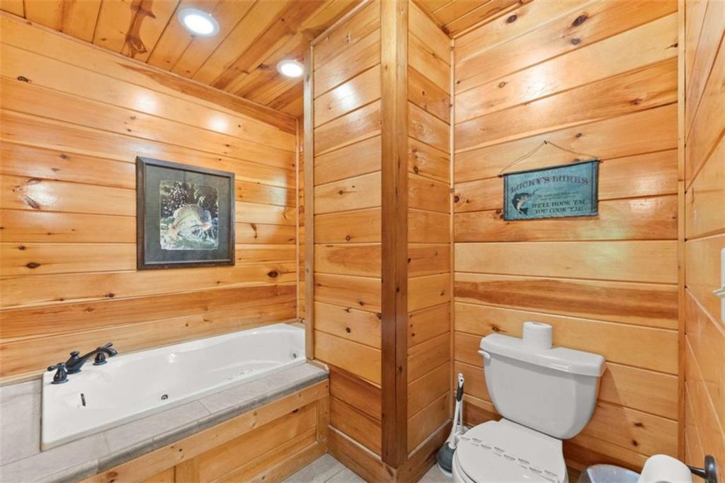 53 Elm Ridge Drive Cleveland, GA 30528 - Photo 23 of 60 a bathroom with a toilet and a shower