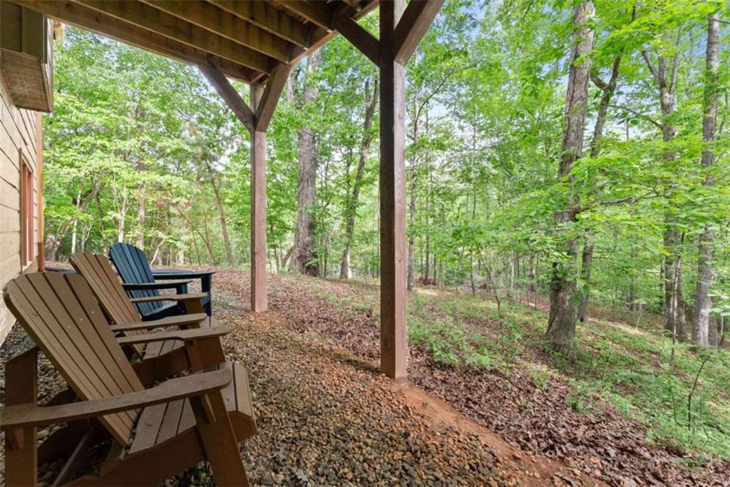 53 Elm Ridge Drive Cleveland, GA 30528 - Photo 39 of 60 a view of a patio with furniture and yard