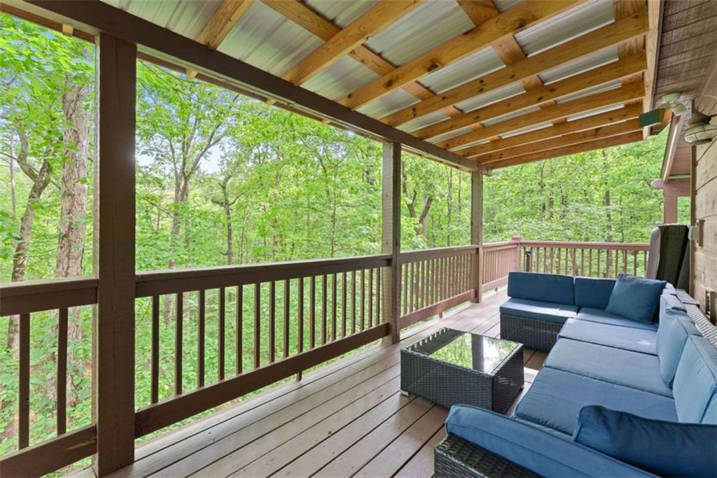 53 Elm Ridge Drive Cleveland, GA 30528 - Photo 40 of 60 a view of a chairs in wooden deck