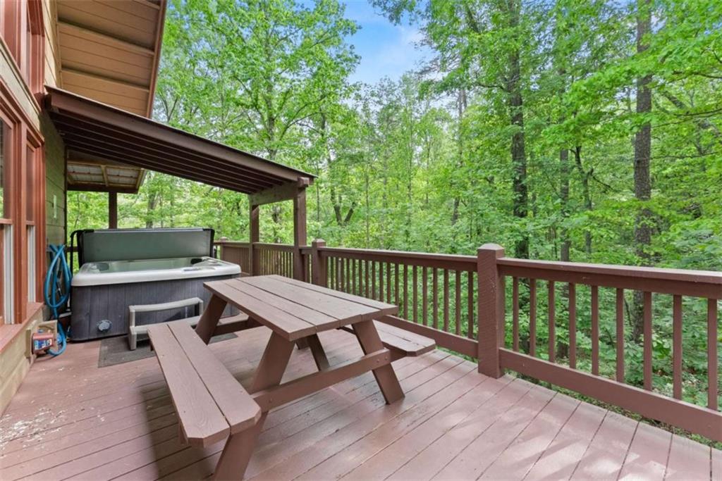53 Elm Ridge Drive Cleveland, GA 30528 - Photo 42 of 60 a view of a two chairs in the deck