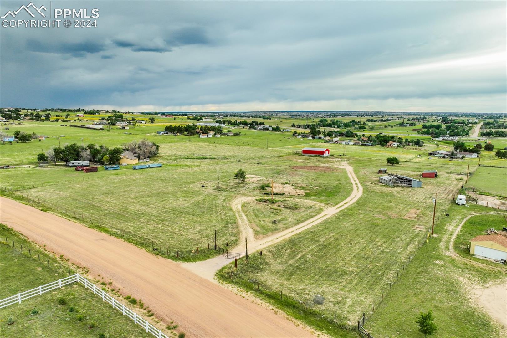 12550 Smith Road Peyton, CO 80831 - Photo 1 of 35 Birds eye view of property featuring a rural view