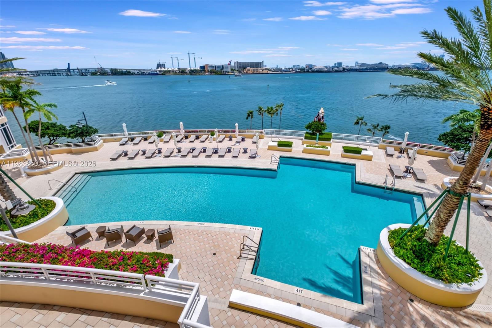 848 Brickell Key Drive, Unit 2602 Miami, FL 33131 - Photo 1 of 40 a view of a lake with outdoor space