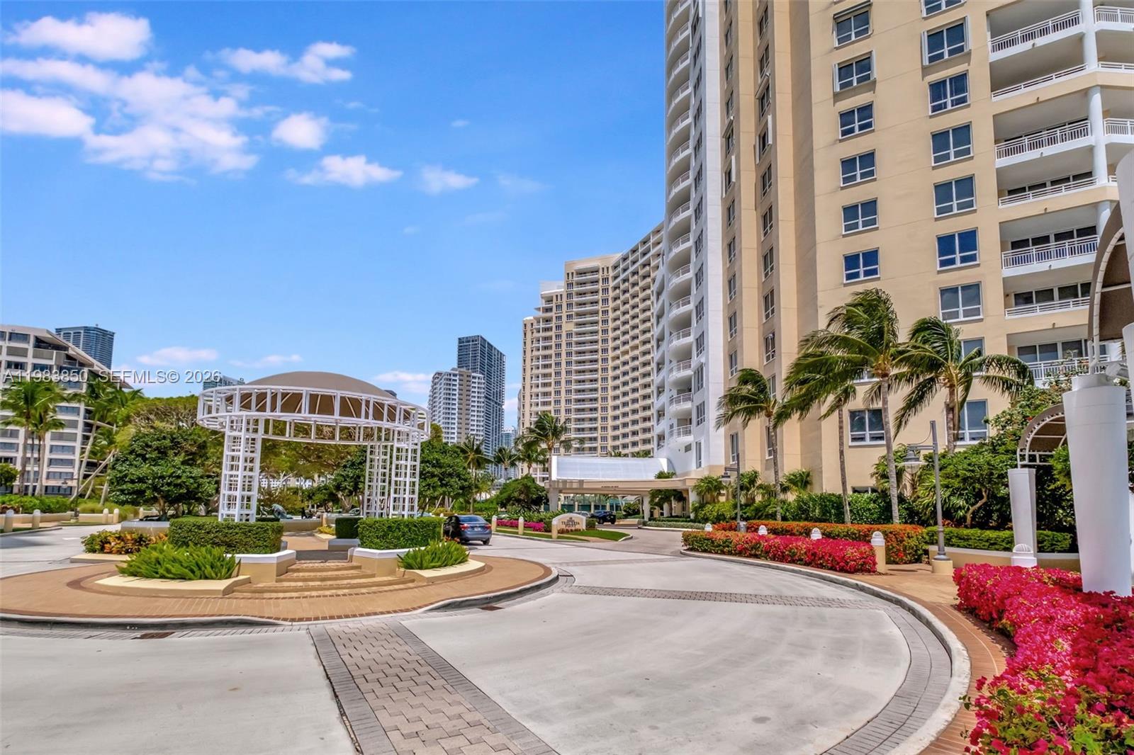 848 Brickell Key Drive, Unit 2602 Miami, FL 33131 - Photo 3 of 40 a view of a city with tall buildings