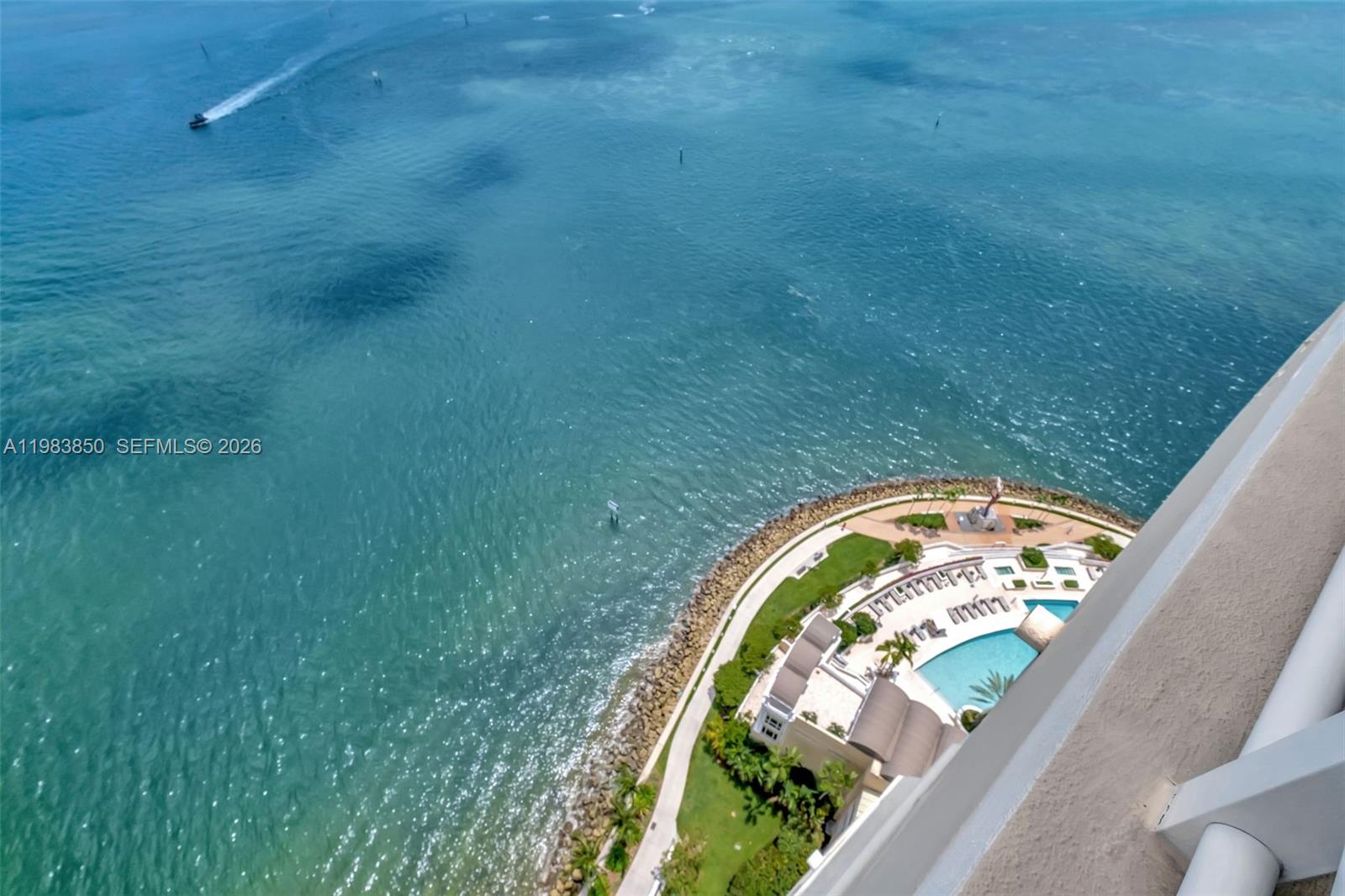 848 Brickell Key Drive, Unit 2602 Miami, FL 33131 - Photo 38 of 40 a view of swimming pool from a balcony