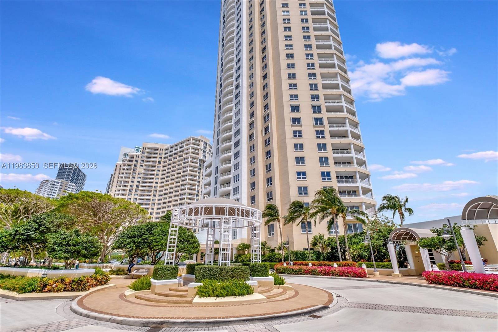 848 Brickell Key Drive, Unit 2602 Miami, FL 33131 - Photo 4 of 40 a front view of a multi story building