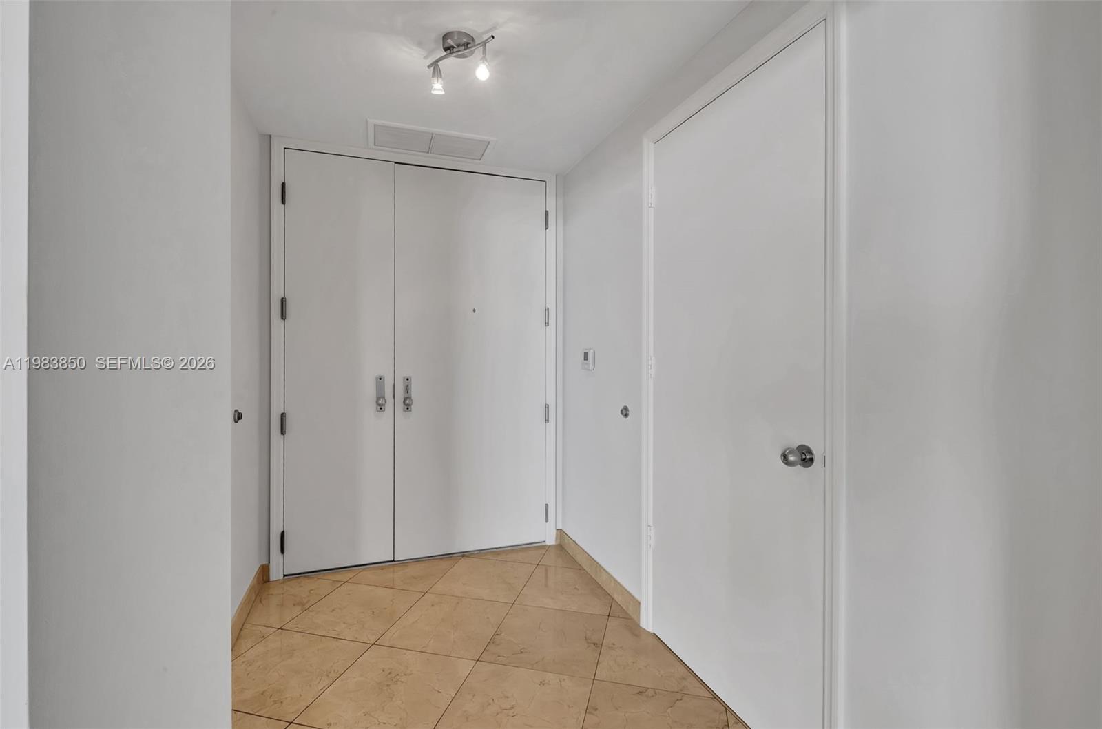 848 Brickell Key Drive, Unit 2602 Miami, FL 33131 - Photo 9 of 40 a view of an empty room