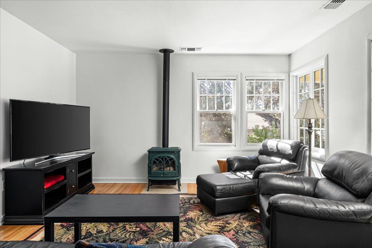 10041 Greenwood Road Grass Valley, CA 95945 - Photo 13 of 65 a living room with furniture and a flat screen tv