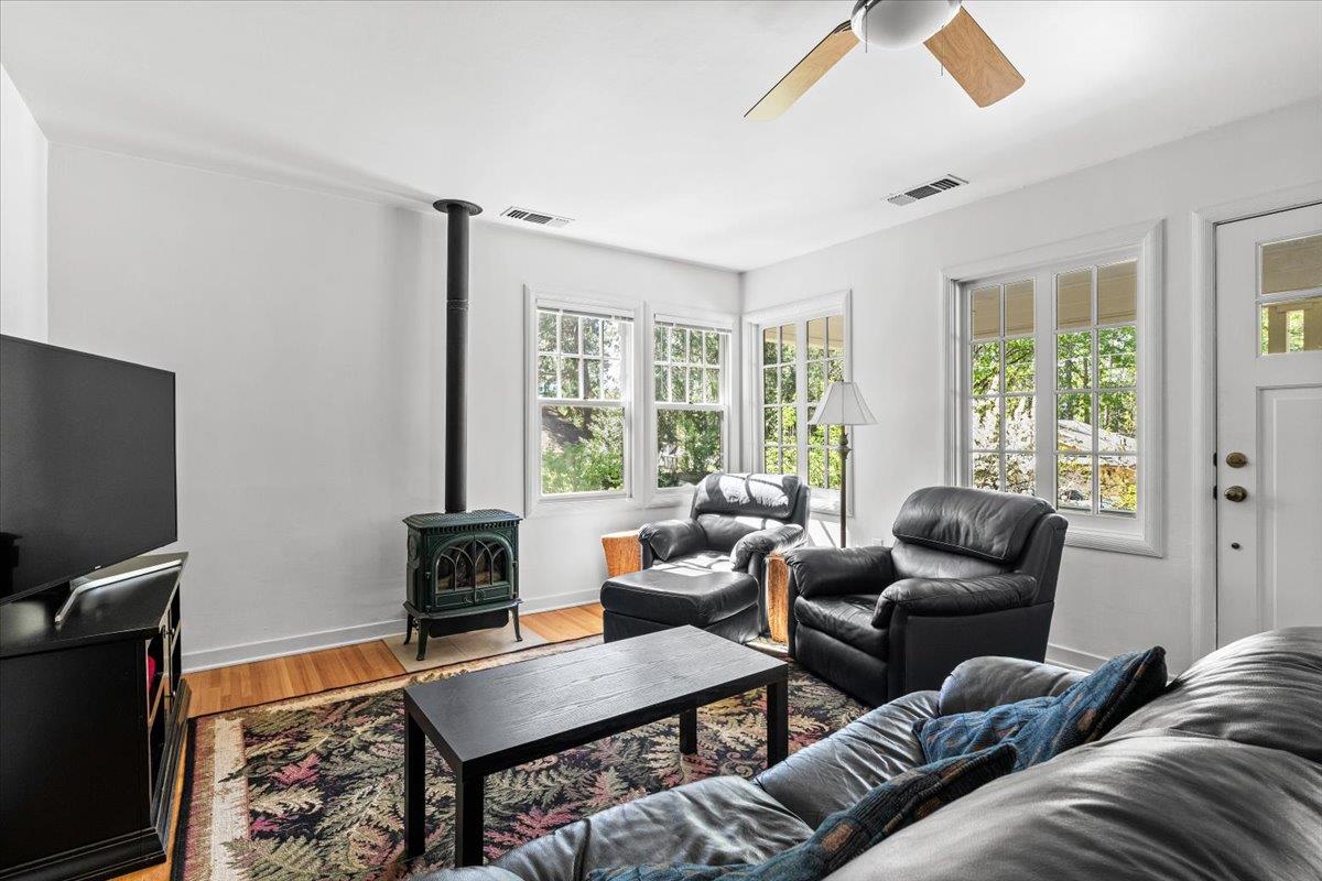10041 Greenwood Road Grass Valley, CA 95945 - Photo 14 of 65 a living room with furniture and a flat screen tv