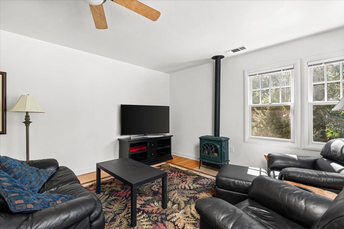 10041 Greenwood Road Grass Valley, CA 95945 - Photo 15 of 65 a living room with furniture and a flat screen tv