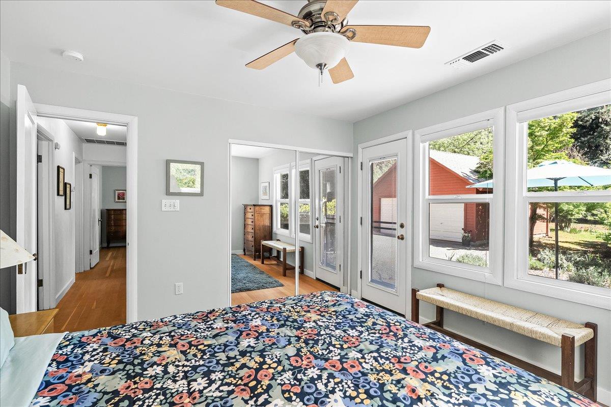 10041 Greenwood Road Grass Valley, CA 95945 - Photo 28 of 65 a bedroom with furniture and a window