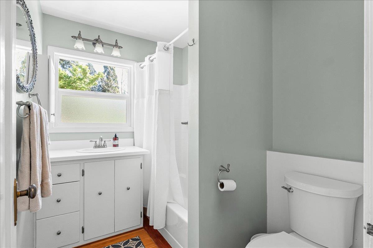 10041 Greenwood Road Grass Valley, CA 95945 - Photo 4 of 65 a bathroom with a granite countertop sink toilet and shower